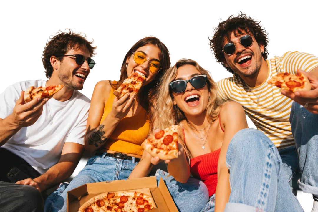 Four friends sharing a pizza